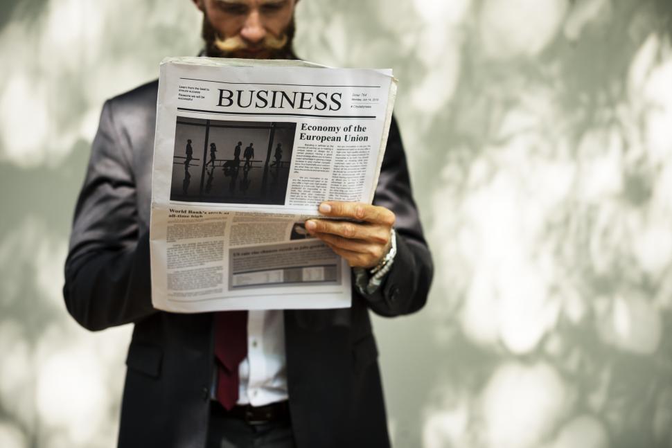 Man reading newspaper